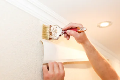 Pose de papier peint à Tornay — revêtements muraux et toiles de verre